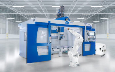 Eine CNC Anlage wird automatisiert von einem Industrieroboter bestückt