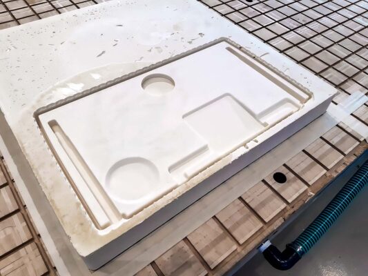 CNC-machined aircraft tray table component for aircraft seating applications